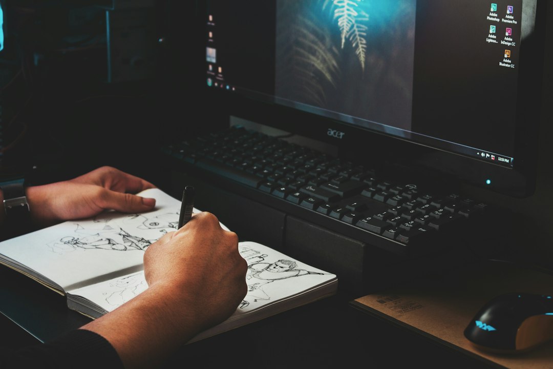 person writing on white paper